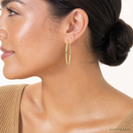 Sterling Silver Gold-plated Oval 2mm Hollow Hoop Earrings - Model Shot