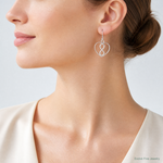 Sterling Silver Rhodium-plated Polished Infinity Open Heart Dangle Earrings - Model Shot