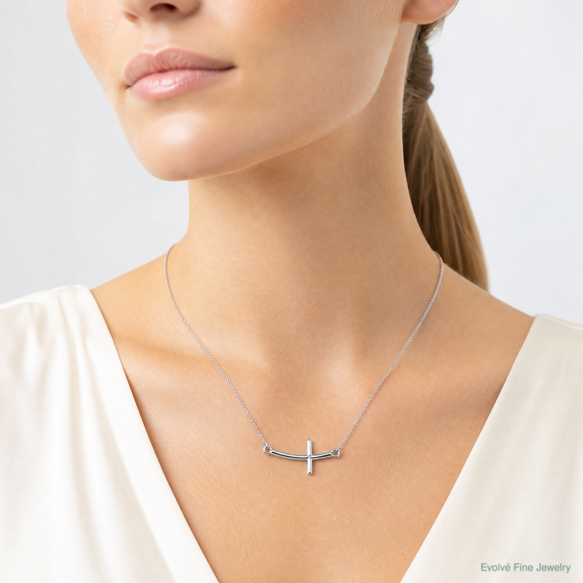 Sterling Silver Rhodium-plated Small Sideways Curved Cross Necklace - Model Shot