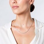Sterling Silver Rh-plated Small Off-Set Sideways Curved Cross Necklace - Model Shot