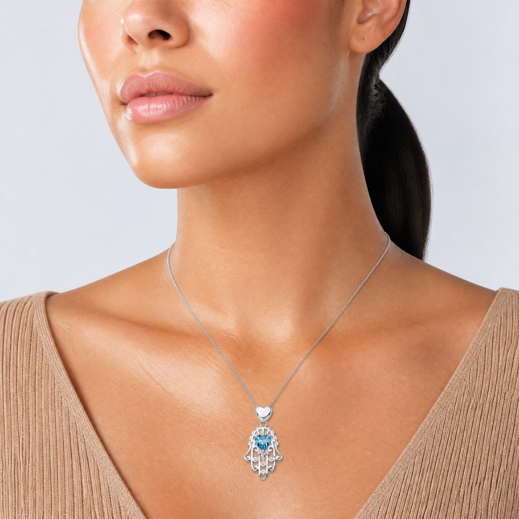 Sterling Silver Blue and Clear CZ Hamsa Necklace - Model Shot