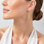 Sterling Silver Gold-tone Polished and Textured Infinity Dangle Earrings - Model Shot