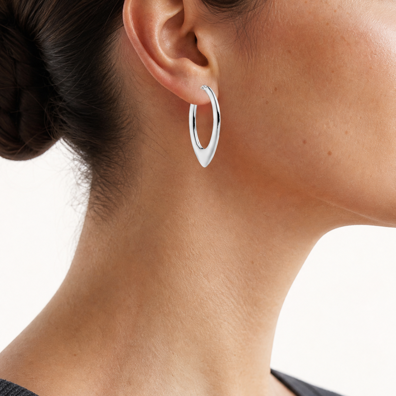 Leslie's Sterling Silver Rhod-plated Polished Oval Hoop Earrings - Model Shot