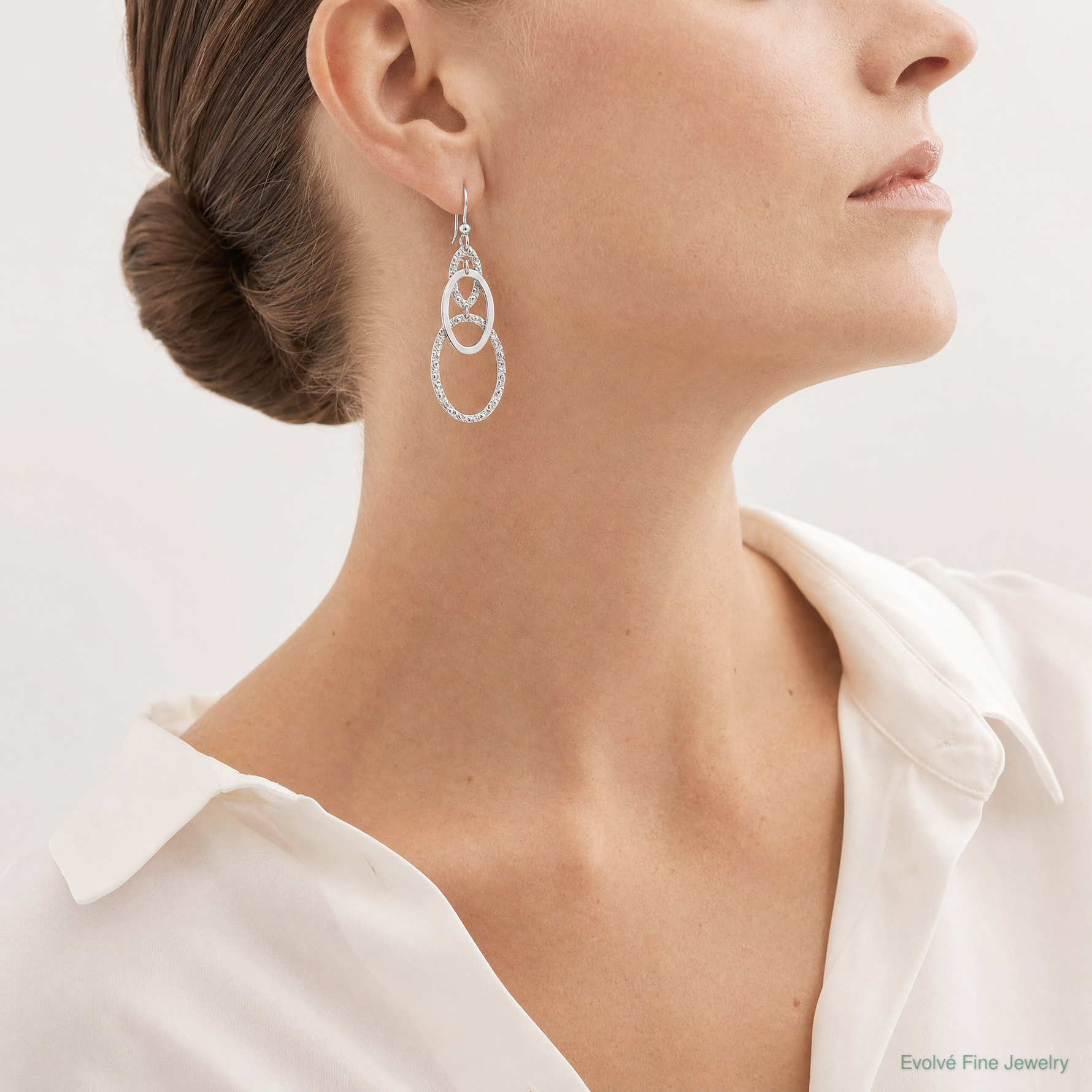 Leslie's Sterling Silver Rh-plated Polished/Textured Ovals Dangle Earrings - Model Shot