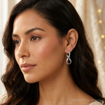 Leslie's Sterling Silver RH-plated Polished Twisted Hoop Earrings - Model Shot
