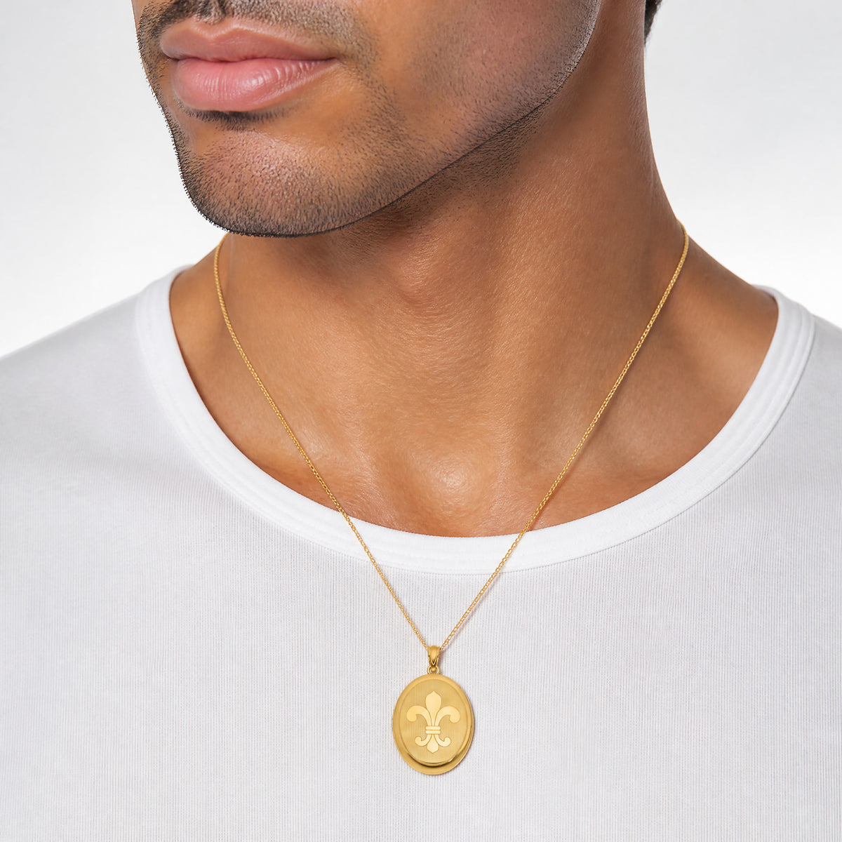 SS Gold-plated Brushed And Polished Fleur De Lis 28mm Oval Locket - Model Shot