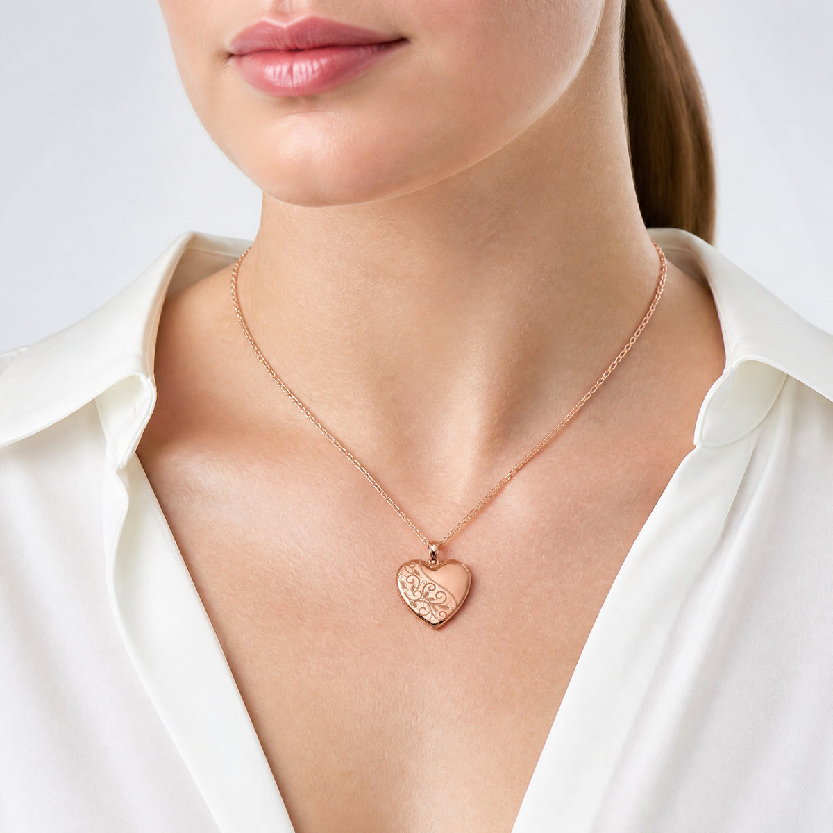 Sterling Silver Rose Gold-plated 24mm Scrolled Heart Family Locket - Model Shot