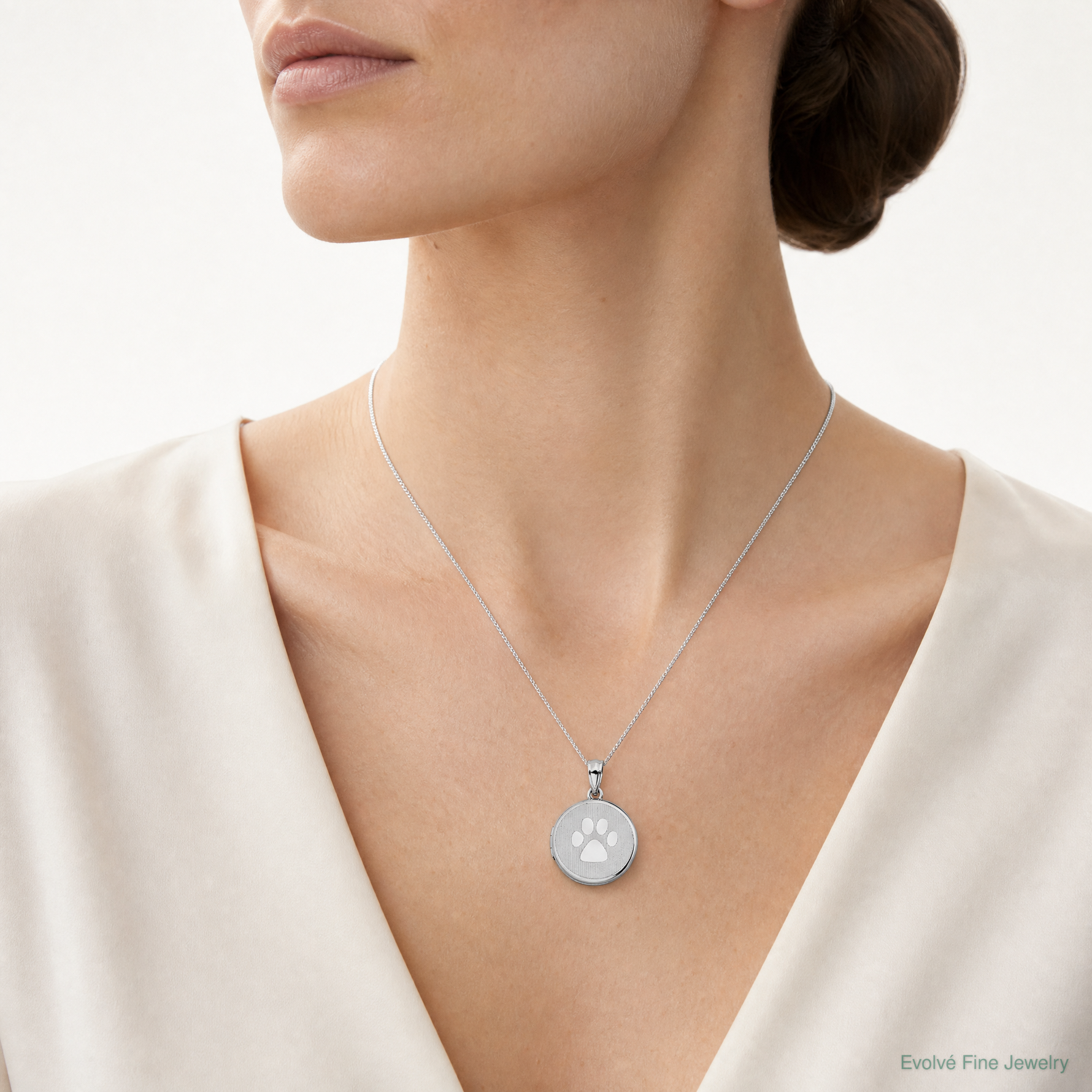 Sterling Silver Rhodium 20mm Grooved & Polished Pawprint Round Locket - Model Shot