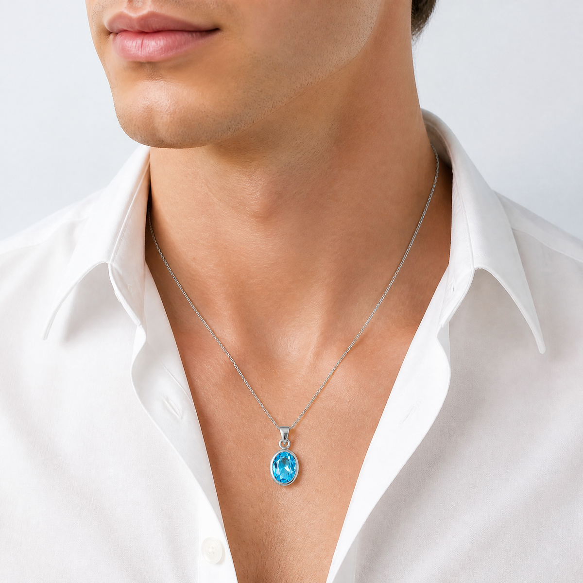 Sterling Silver Rhodium-plated Polished Blue Topaz Oval Pendant - Model Shot