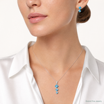 Sterling Silver Polished Blue Topaz Pendant and Post Earrings Set - Model Shot
