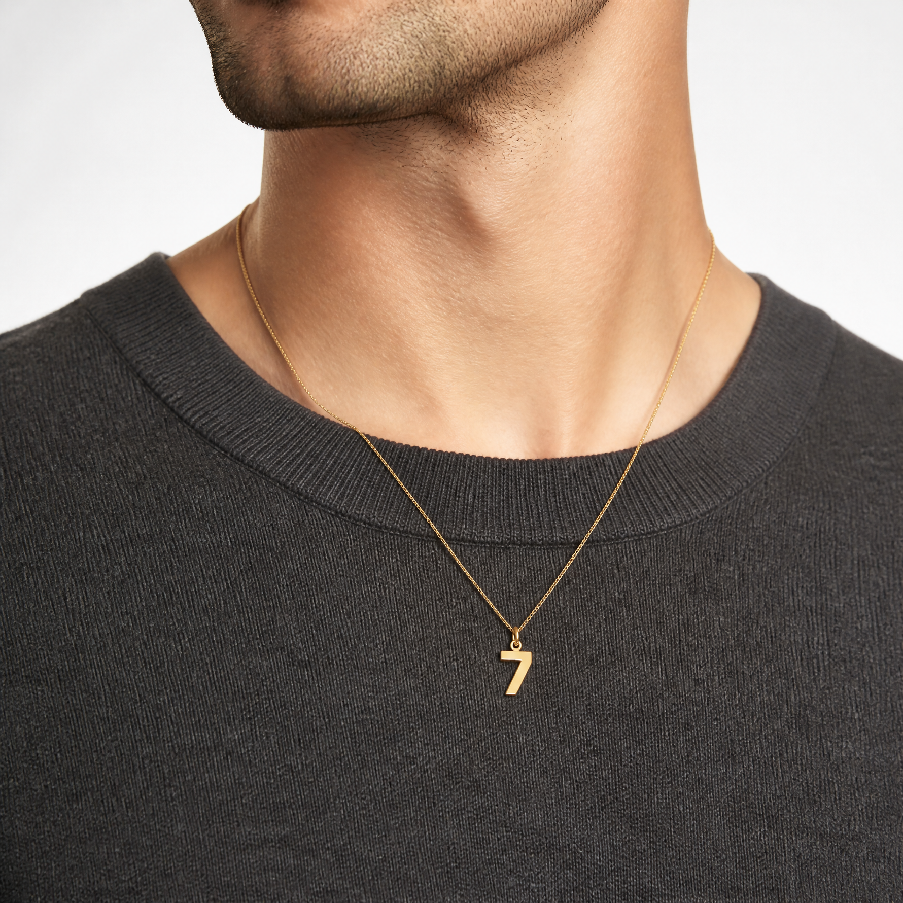 14k Small Polished Number 7 Charm - Model Shot