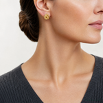 14k Polished & Twisted Love Knot Post Earrings - Model Shot