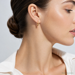 14k Polished 2x15mm Lightweight Tube Hoop Earrings - Model Shot