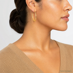 14k Polished 2x50mm  Lightweight Tube Hoop Earrings - Model Shot