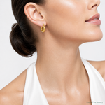 14K Polished 3mm Tube Hoop Earrings - Model Shot