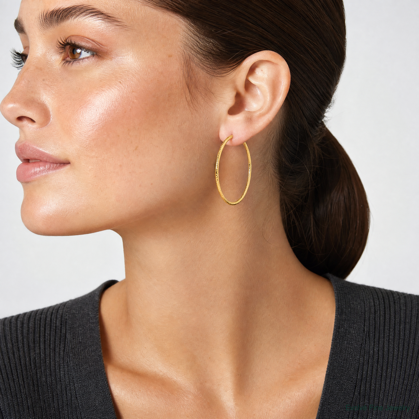 14k Diamond-cut 2mm Round Tube Hoop Earrings - Model Shot