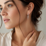 14k White Gold Polished Cross Dangle Post Earrings - Model Shot