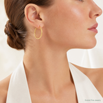 14K Knife Edge Diamond-cut Hollow Hoop Earrings - Model Shot