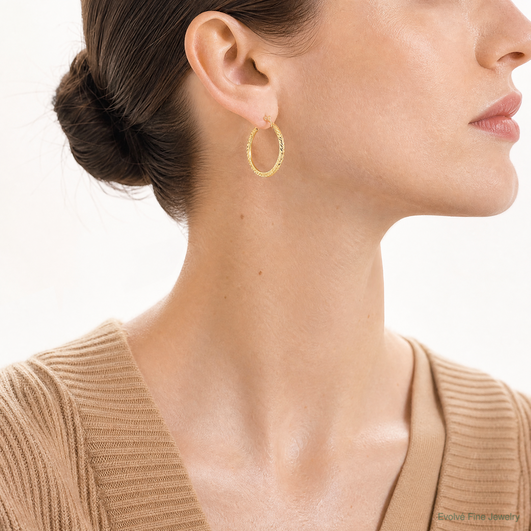 14K Polished Diamond-cut Hoop Earrings - Model Shot