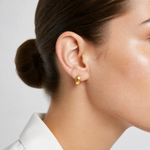 14K Polished and Diamond-cut Huggie Hoop Earrings - Model Shot