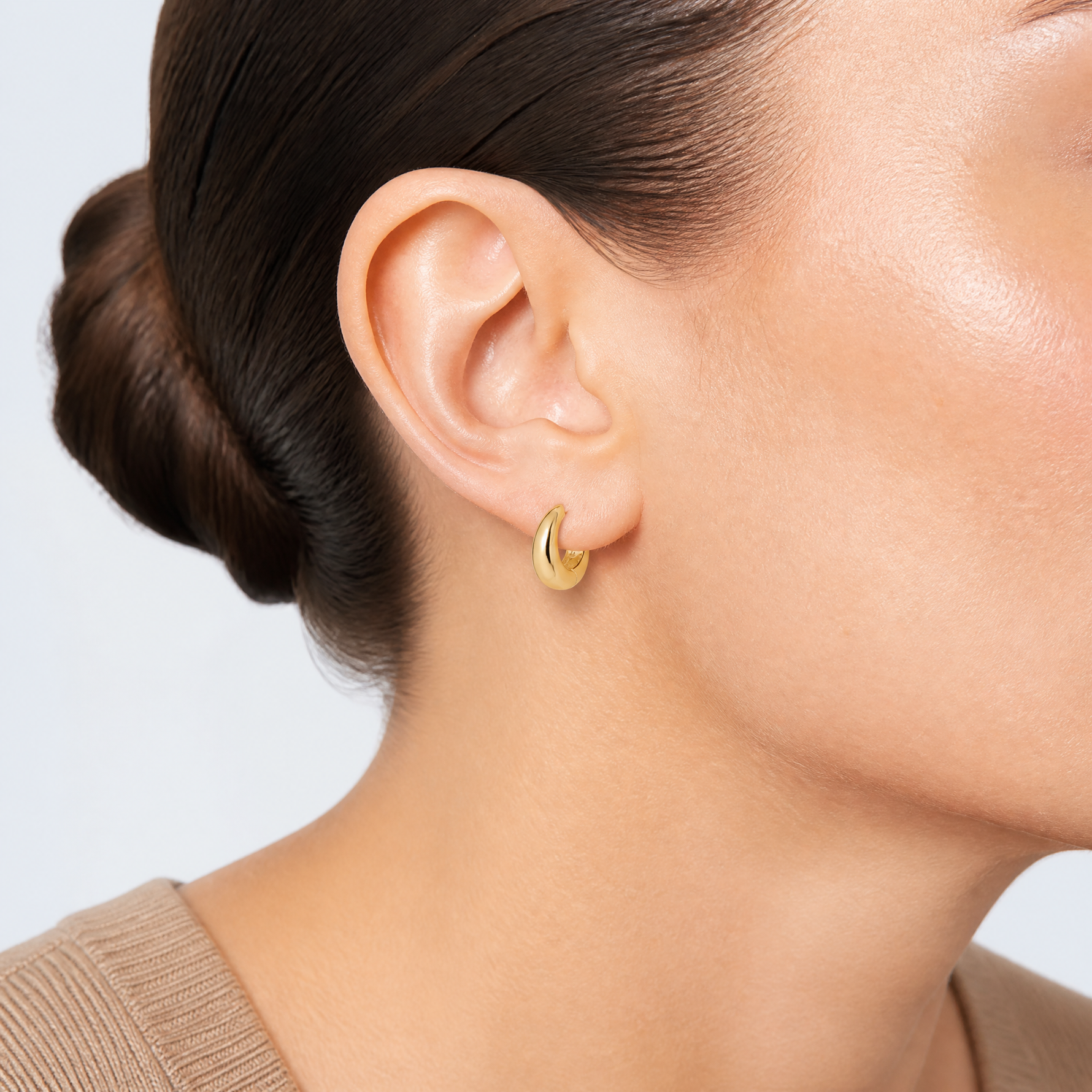 14K Polished Hinged Huggie Hoop Earrings - Model Shot