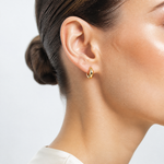 14K Polished Hinged Huggie Hoop Earrings - Model Shot