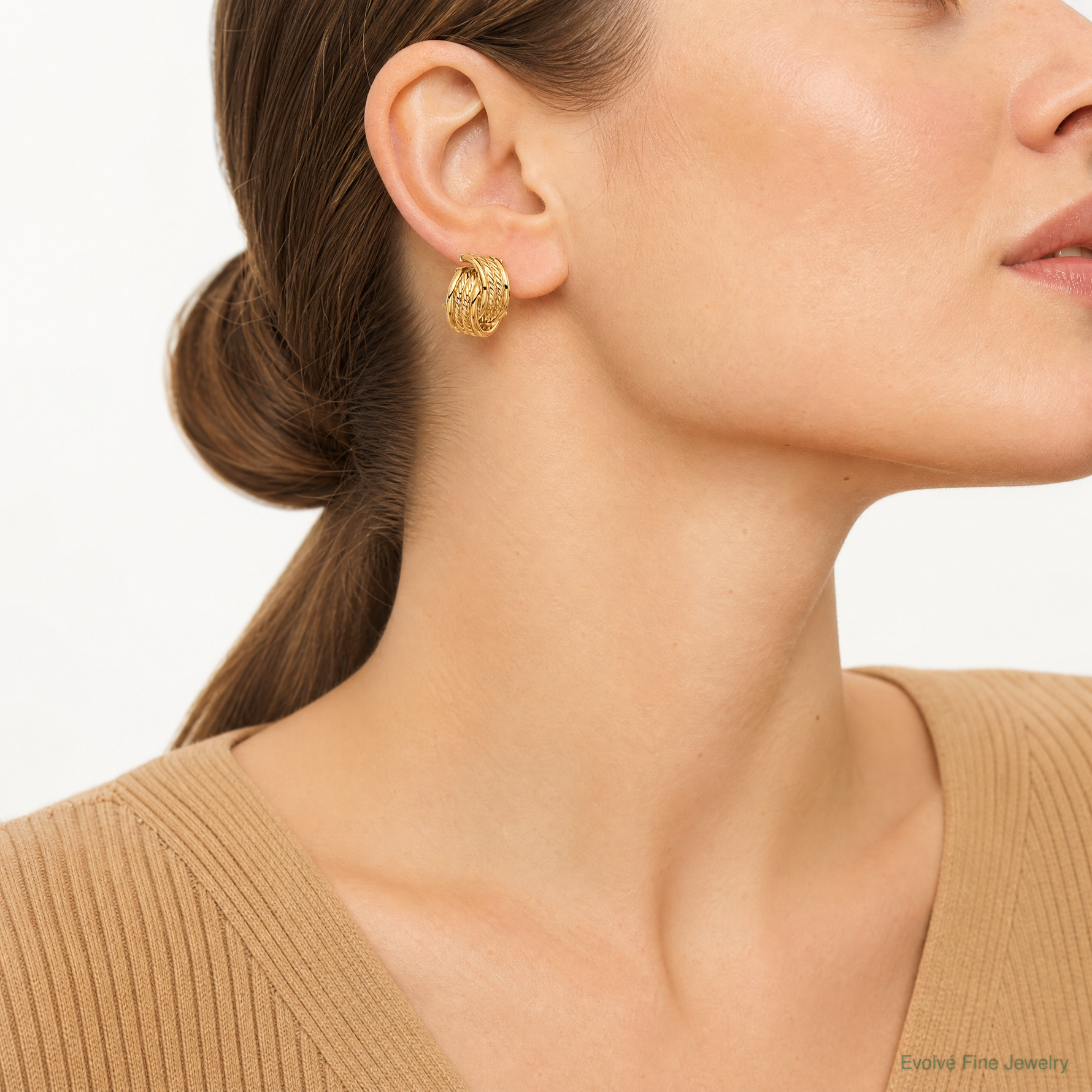 14K Polished and Textured Twisted Post Earrings - Model Shot