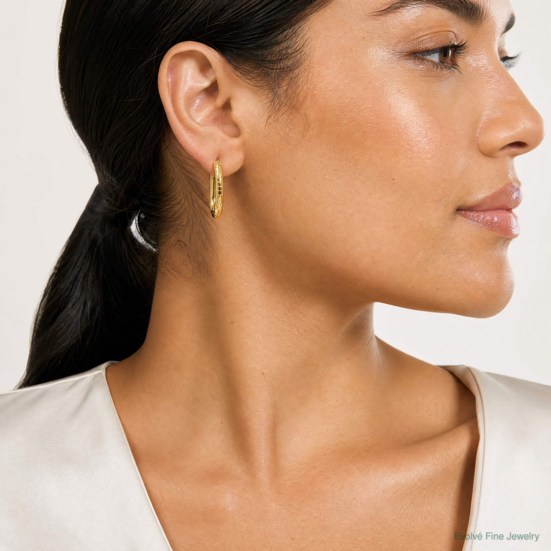 14k Polished and Grooved Oval Hinged Hoop Earrings - Model Shot