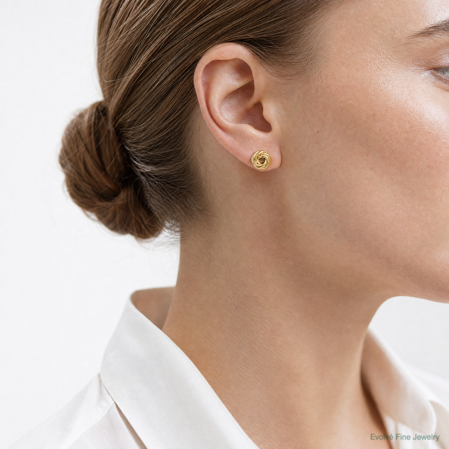 14k Polished Love Knot Post Earrings - Model Shot