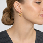 14k Polished Brushed and Diamond-cut Heart Hoop Earrings - Model Shot