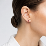14k White Gold 4mm Ruby Stud Earrings - Model Shot