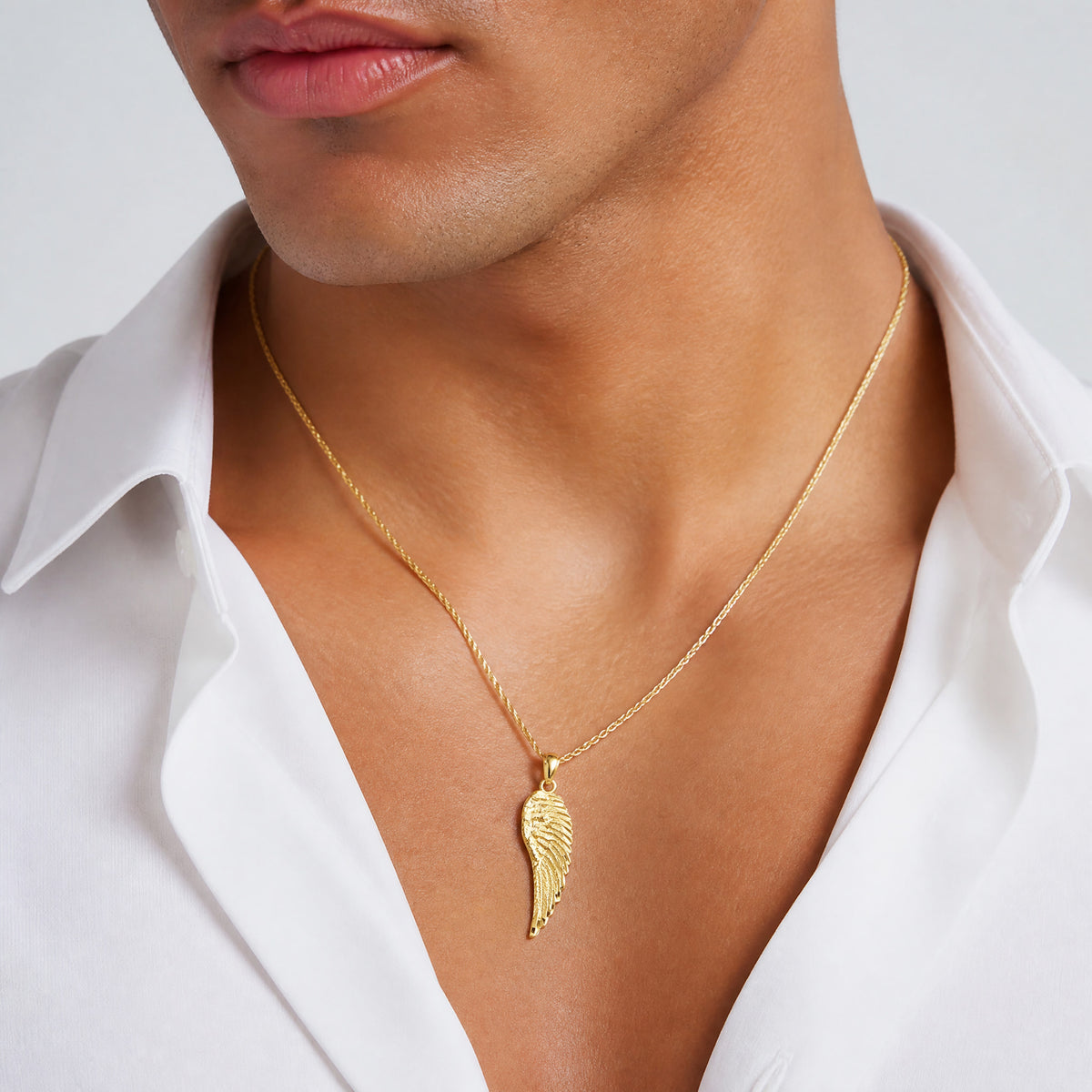 14K Gold Polished and Textured Angel Wing Pendant - Model Shot
