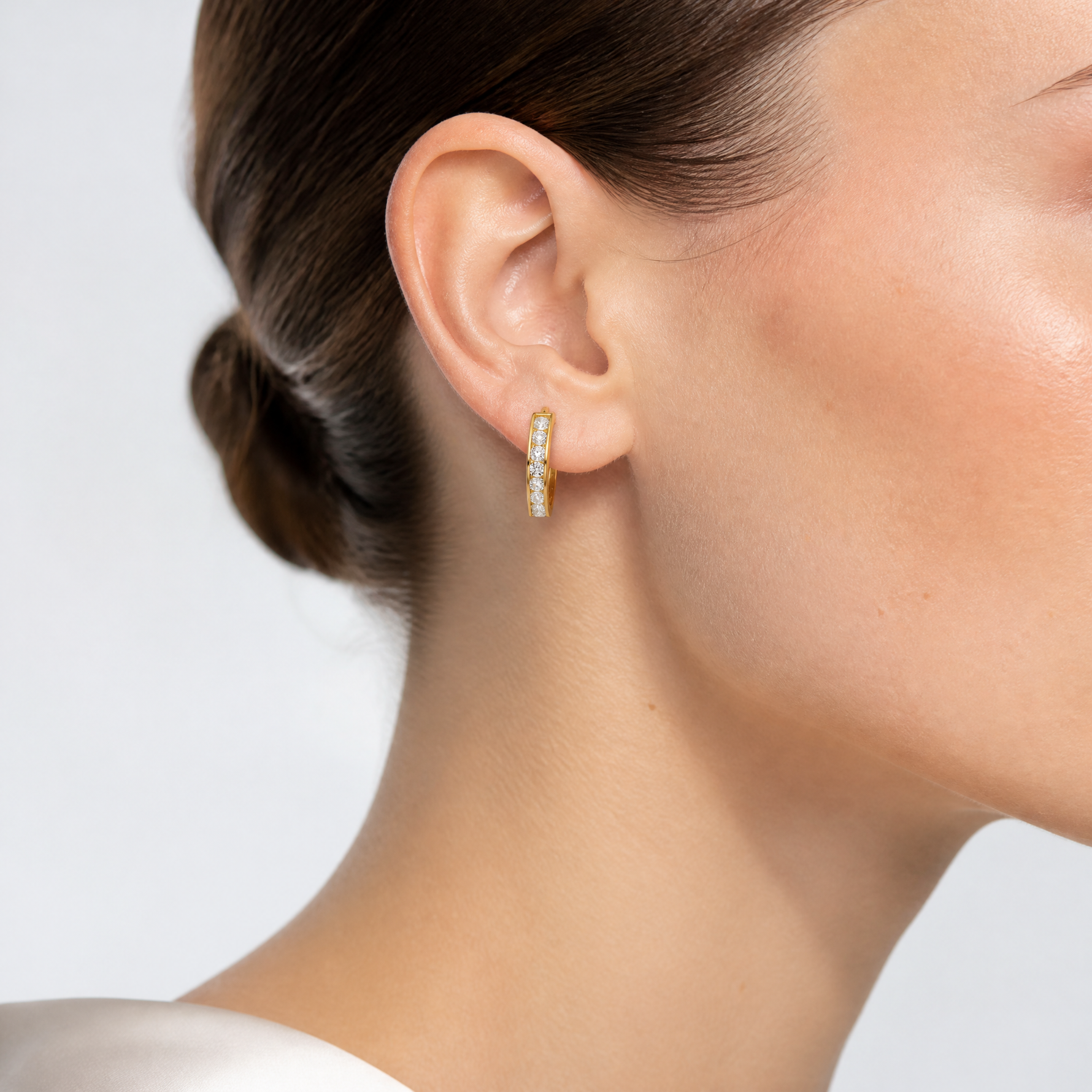 14k Polished CZ 4x20mm Huggie Hoop Earrings - Model Shot