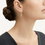 14K Polished Teardrop CZ Post Dangle Earrings - Model Shot