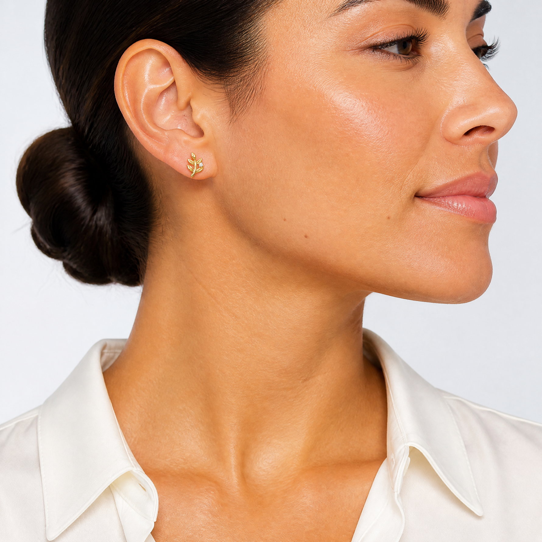 14k Polished CZ Leaf Post Earrings - Model Shot