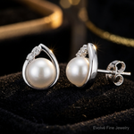 Sterling Silver Rhodium-plated 5mm FW Cultured Pearl & Diamond Post Ear - Close-up View