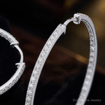 Sterling Silver Rhodium-plated Diamond In & Out Hoop Earrings - Close-up View