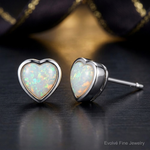 Sterling Silver Rhodium Plated Lab Created Opal Post Earrings - Close-up View