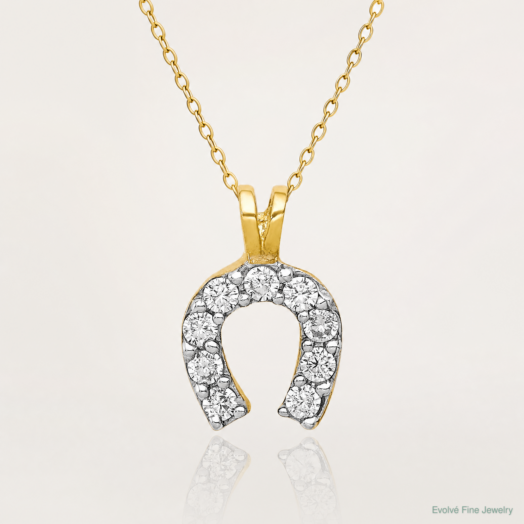 10k Small CZ Horseshoe Charm - Lifestyle View