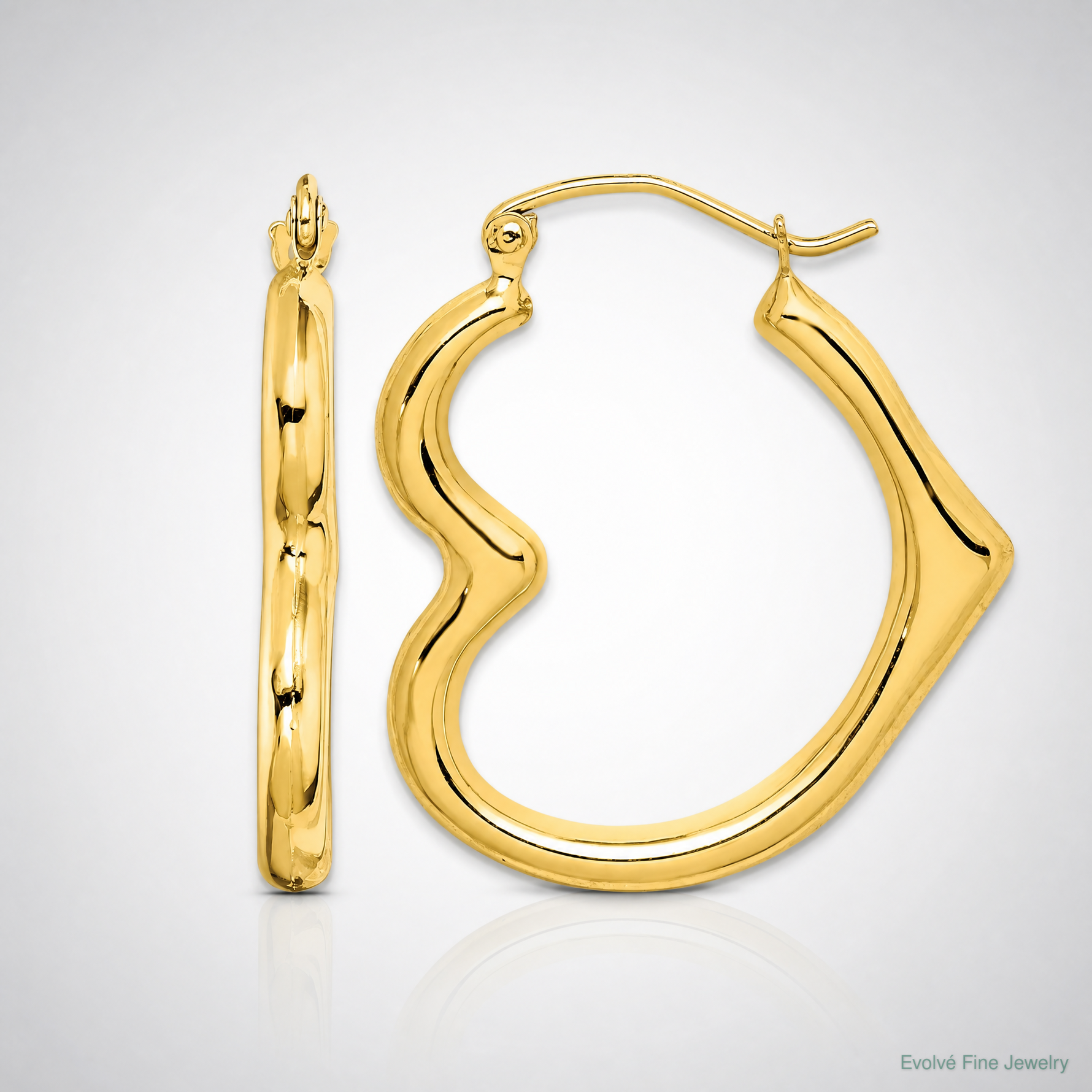 10K Hollow Heart Shape Hoop Earrings - Lifestyle View