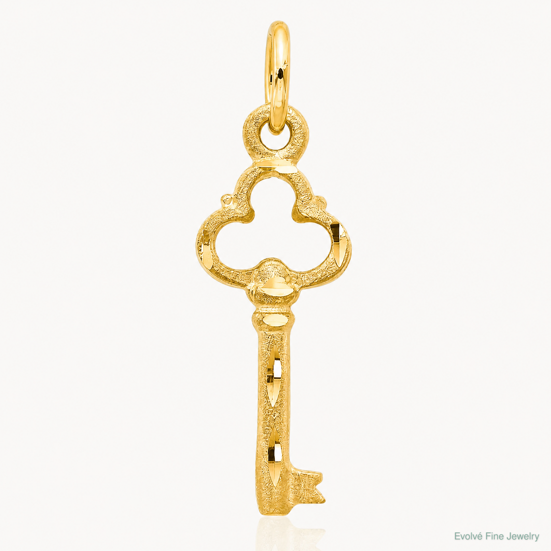 14K Polished Diamond-cut 3D Key Charm - Lifestyle View