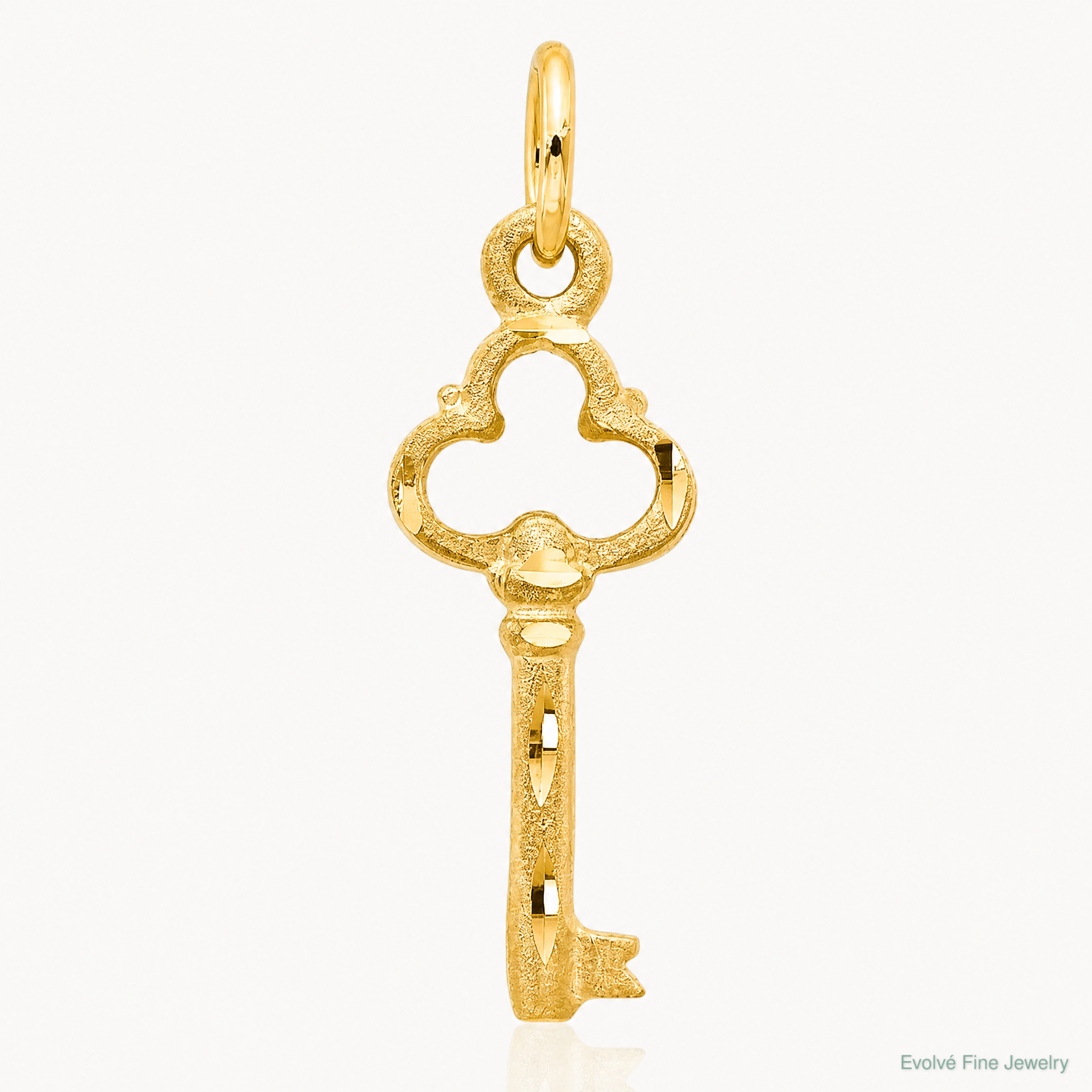 14K Polished Diamond-cut 3D Key Charm - Lifestyle View