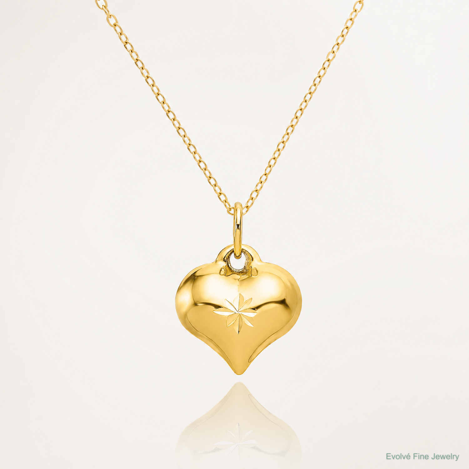 14K Polished 3-D Diamond-cut Puffed Heart Charm - Lifestyle View
