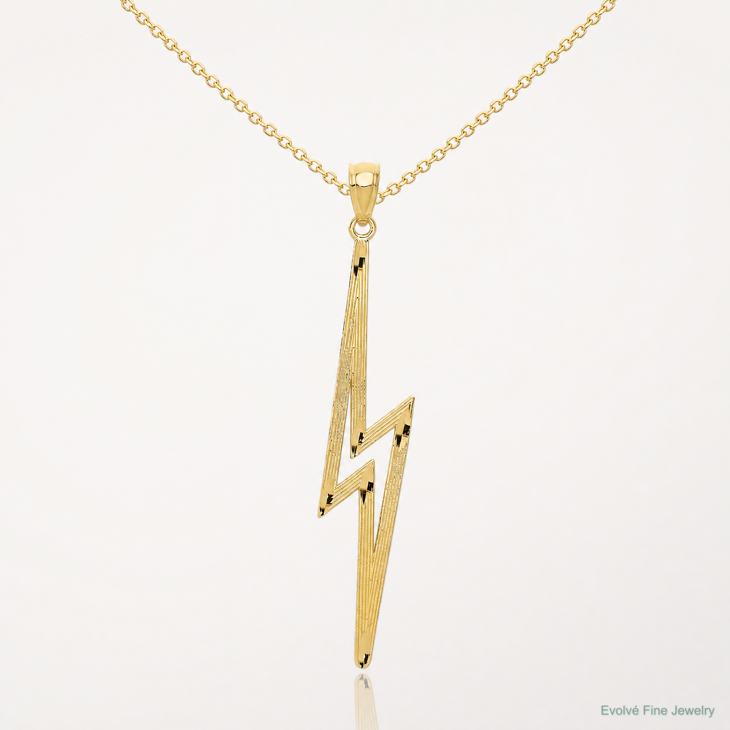 14k Polished D/C Lightning Bolt Pendant - Lifestyle View
