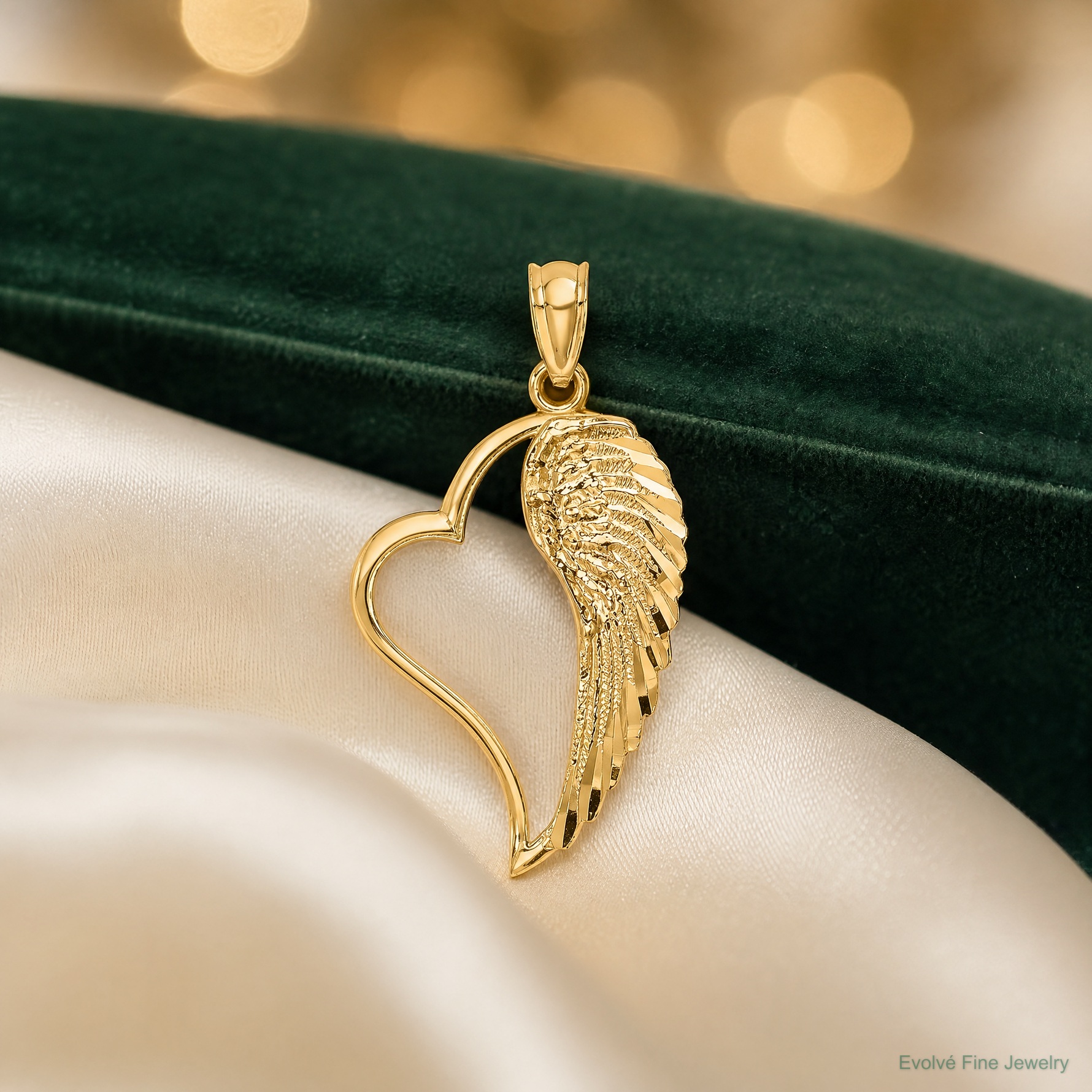 14K Polished Heart and Wing Pendant - Lifestyle View