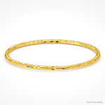 14k Polished Textured Slip-on Bangle Bracelet - Lifestyle View