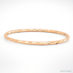 14K Rose Gold Polished Textured Slip-on Bangle Bracelet - Lifestyle View