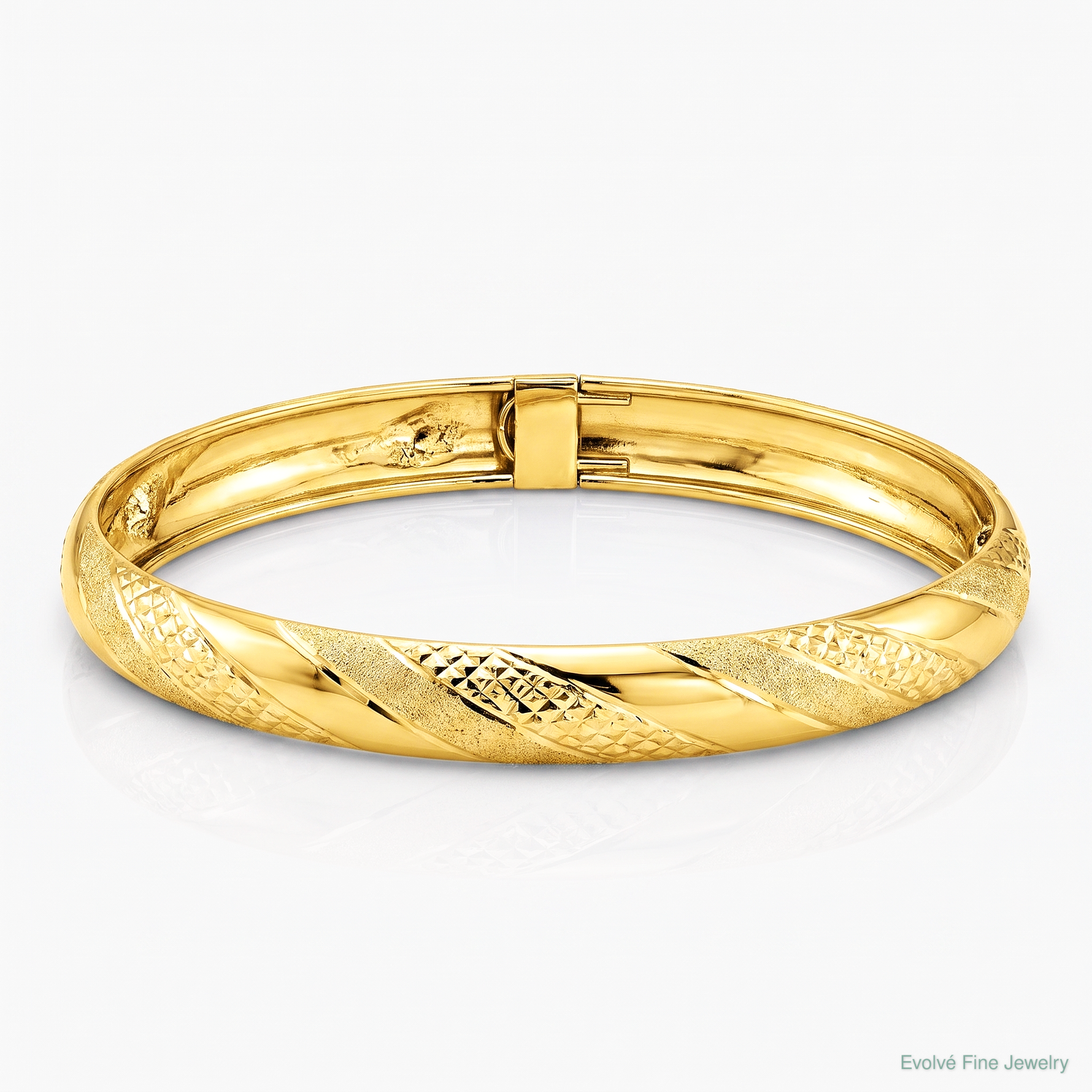 14k Twisted Diamond-cut Flexible Bangle - Lifestyle View