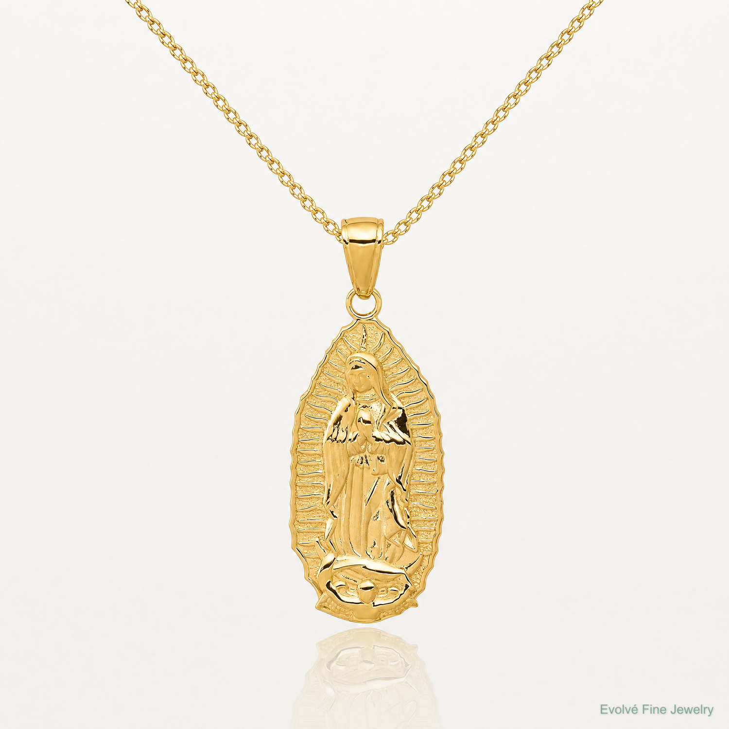 14K Polished Our Lady Of Guadalupe Oval Disc Engraved Pendant - Lifestyle View