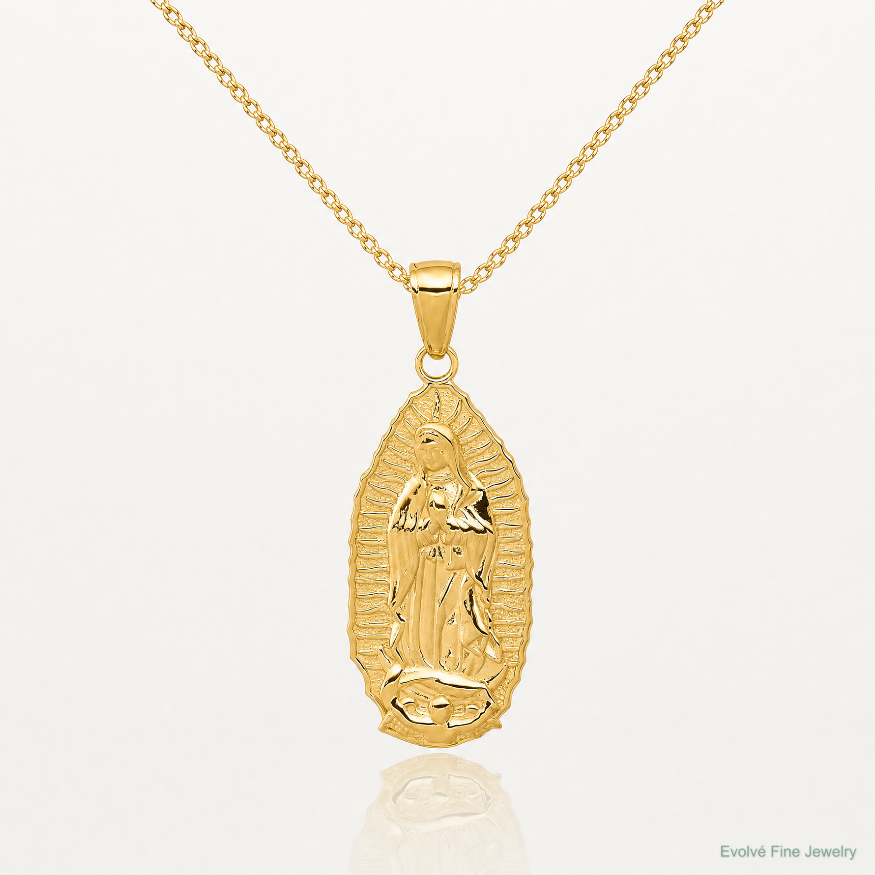 14K Polished Our Lady Of Guadalupe Oval Disc Engraved Pendant - Lifestyle View